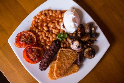 a plate of food with beans beans and toast at Kings Arms in Penzance