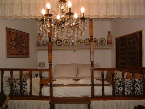 Postel nebo postele na pokoji v ubytování Yiayia's Home