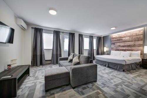 Postel nebo postele na pokoji v ubytování Terrasse Royale Hotel