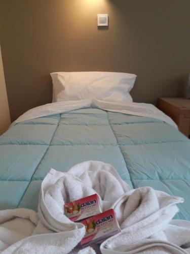 Una cama o camas en una habitación de Filon