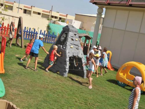 a group of children playing in a playground at Concorde El Salam Sharm El Sheikh Front Hotel in Sharm El Sheikh