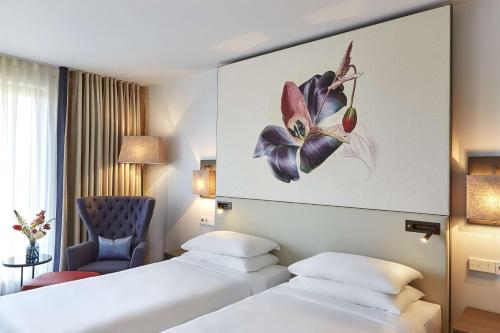 Кровать или кровати в номере Hyatt Regency Amsterdam