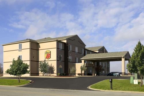a rendering of a hotel with a parking lot at Super 8 by Wyndham Corydon in Corydon