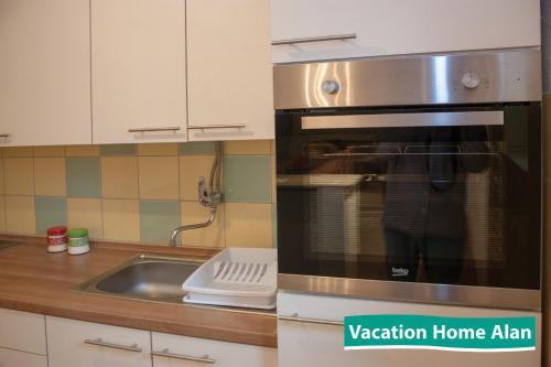 Η κουζίνα ή μικρή κουζίνα στο Vacation home Alan