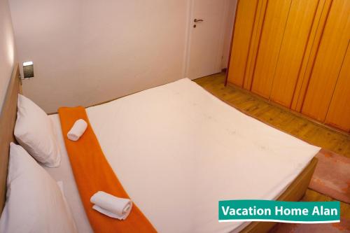 Ένα ή περισσότερα κρεβάτια σε δωμάτιο στο Vacation home Alan