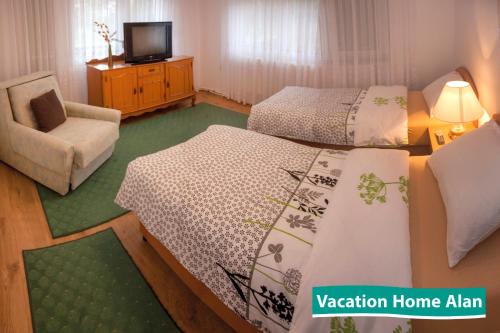 Ένα ή περισσότερα κρεβάτια σε δωμάτιο στο Vacation home Alan