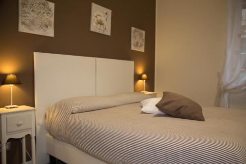 Monaco Home Campaldino tesisinde bir odada yatak veya yataklar