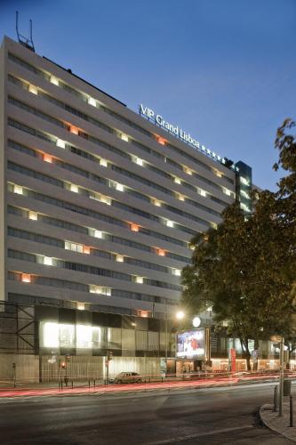 a large building with a sign on the side of it at VIP Grand Lisboa Hotel & Spa in Lisbon