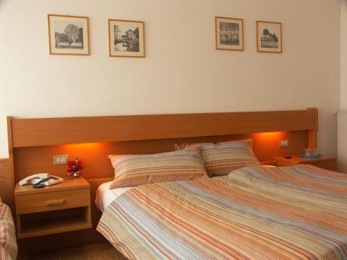 Postel nebo postele na pokoji v ubytování Hotel Villa Clara