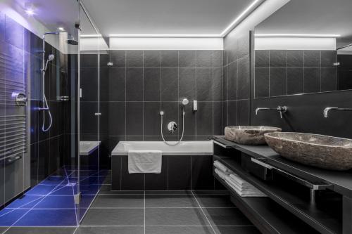 Kúpeľňa v ubytovaní Hotel Conturines