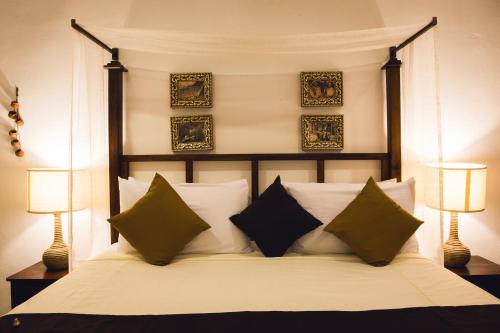 Un ou plusieurs lits dans un hébergement de l'établissement La Leyenda Boutique Hotel by Bunik