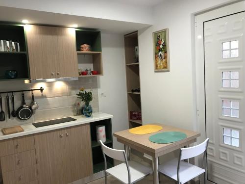 Η κουζίνα ή μικρή κουζίνα στο Andi Apartments
