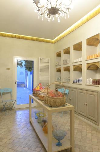 Una cocina o zona de cocina en Dar Marsa Cubes