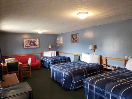 Postel nebo postele na pokoji v ubytování Big Bear Motel