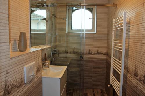 Et badeværelse på Apartament Centru Istoric Radu