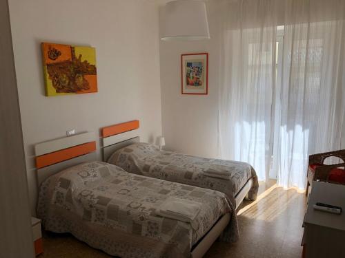 Posteľ alebo postele v izbe v ubytovaní Miky Home