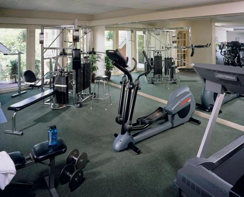 a gym with several exercise bikes and treadmills at Green Mountain Inn in Stowe