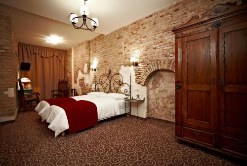 Postel nebo postele na pokoji v ubytování Boutique Hotel Justus