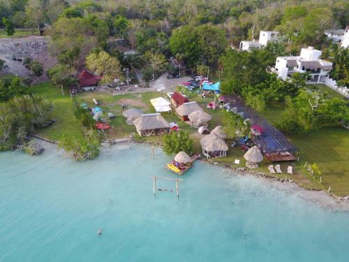 an aerial view of a resort on the water at Ecocamping Yaxche in Bacalar