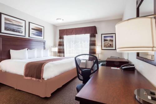 Una cama o camas en una habitación de Ramada by Wyndham Creston