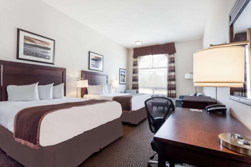 Una cama o camas en una habitación de Ramada by Wyndham Creston