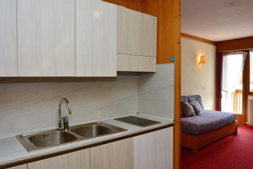 Kuchyňa alebo kuchynka v ubytovaní Ski Residence