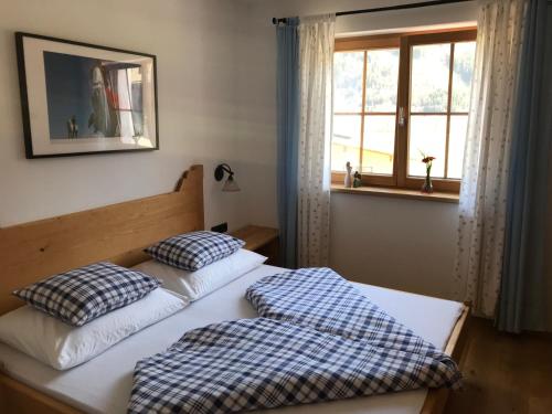 Postel nebo postele na pokoji v ubytování Ferienwohnung Gruber-Hansen