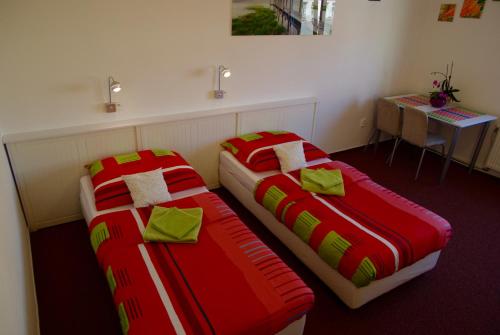 Posteľ alebo postele v izbe v ubytovaní Hostel Humpolec