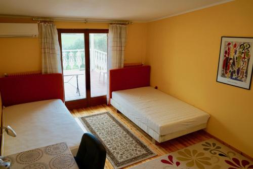 A bed or beds in a room at Villa Voirani