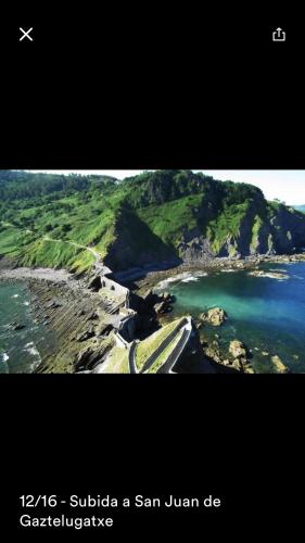 an aerial view of an island in the ocean at Lauramer Apartamento Bakio in Bakio