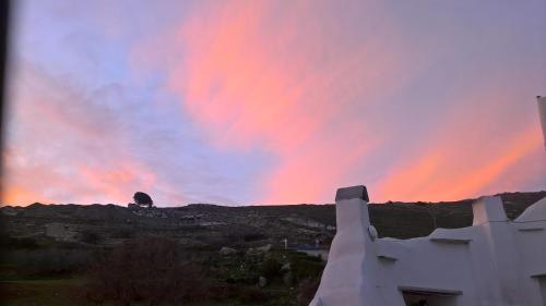 a view of a colorful sky at sunset at Balcony to the Aegean in Stení