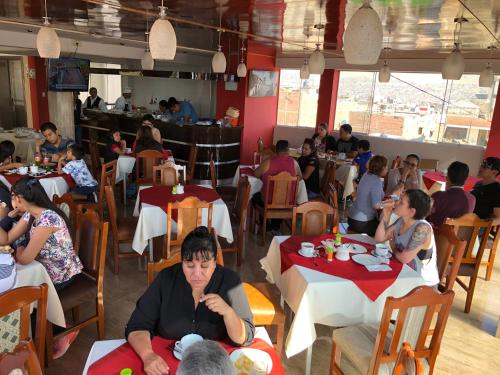En restaurant eller et andet spisested på Sumaq Hotel Tacna