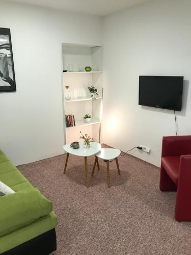 TV a/nebo společenská místnost v ubytování Apartmans Les