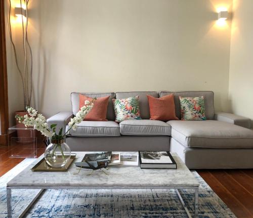 a living room with a couch and a coffee table at Bairro Alto in Lisbon