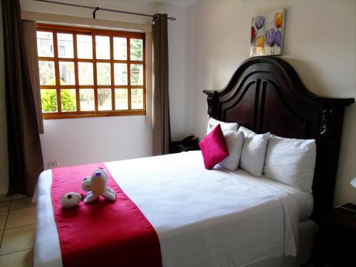 Hotel Los Pinosにあるベッド