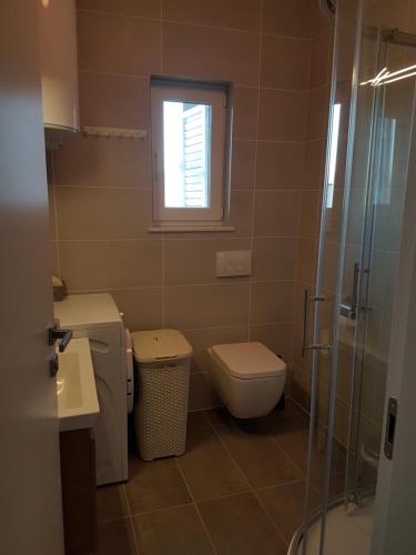 Kúpeľňa v ubytovaní Apartment ARIA Exclusive Petrcane