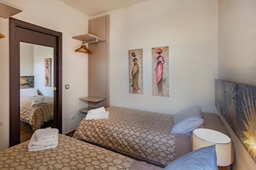 Cama o camas de una habitación en Lances Beach Penthouses