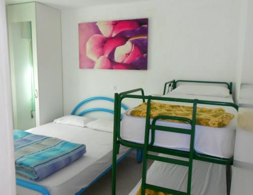 Voodi või voodid majutusasutuse Grazia Apartment toas