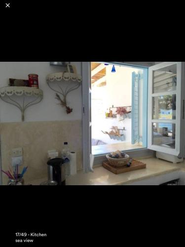 Η κουζίνα ή μικρή κουζίνα στο Villa Campos Yalos beach
