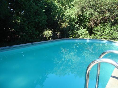 Swimmingpoolen hos eller tæt på Charmant Appartement Neuf Le Taoume