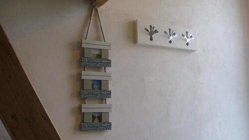 a wall with a toy tower on the wall at Chambre direct piscine in Talence