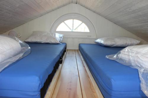 Postel nebo postele na pokoji v ubytování Smeakalles