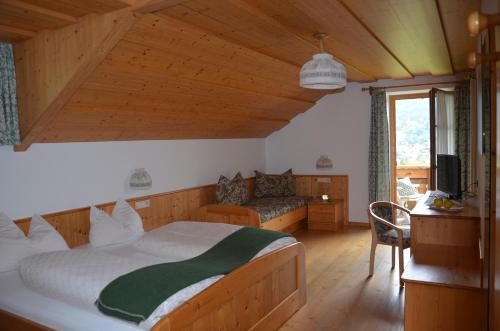 Posteľ alebo postele v izbe v ubytovaní Falkenau