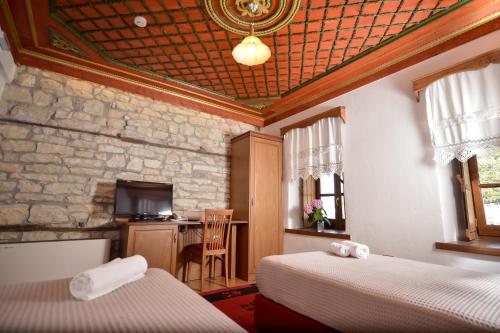 Postel nebo postele na pokoji v ubytování Hotel Kalemi 2
