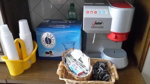 a counter with a basket and a box and some items at Affittacamere di Fabio Principale in Talsano