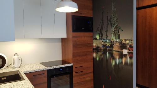 Kuchyňa alebo kuchynka v ubytovaní New apartment 100m from old town and marina