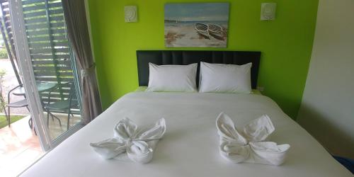 Ένα ή περισσότερα κρεβάτια σε δωμάτιο στο Thip Buri Riverside