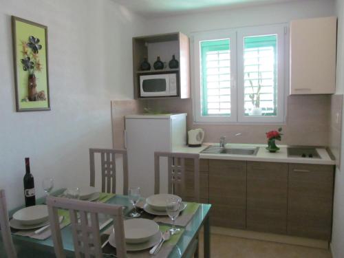 Dapur atau dapur kecil di Apartment Danese Promajna
