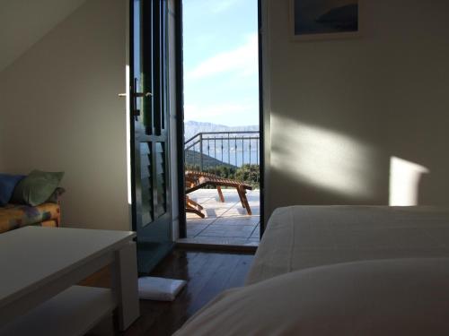 Katil atau katil-katil dalam bilik di Holiday Home Katia