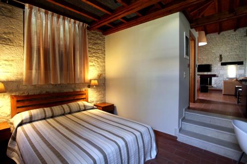 Katil atau katil-katil dalam bilik di Asfendamos